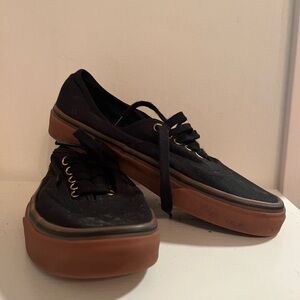 Black and gum Vans shoes